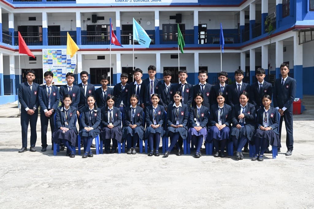 Paragon Academy students in front of the school building